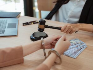 Bail bond blocks on a table representing steps to take after an arrest.
